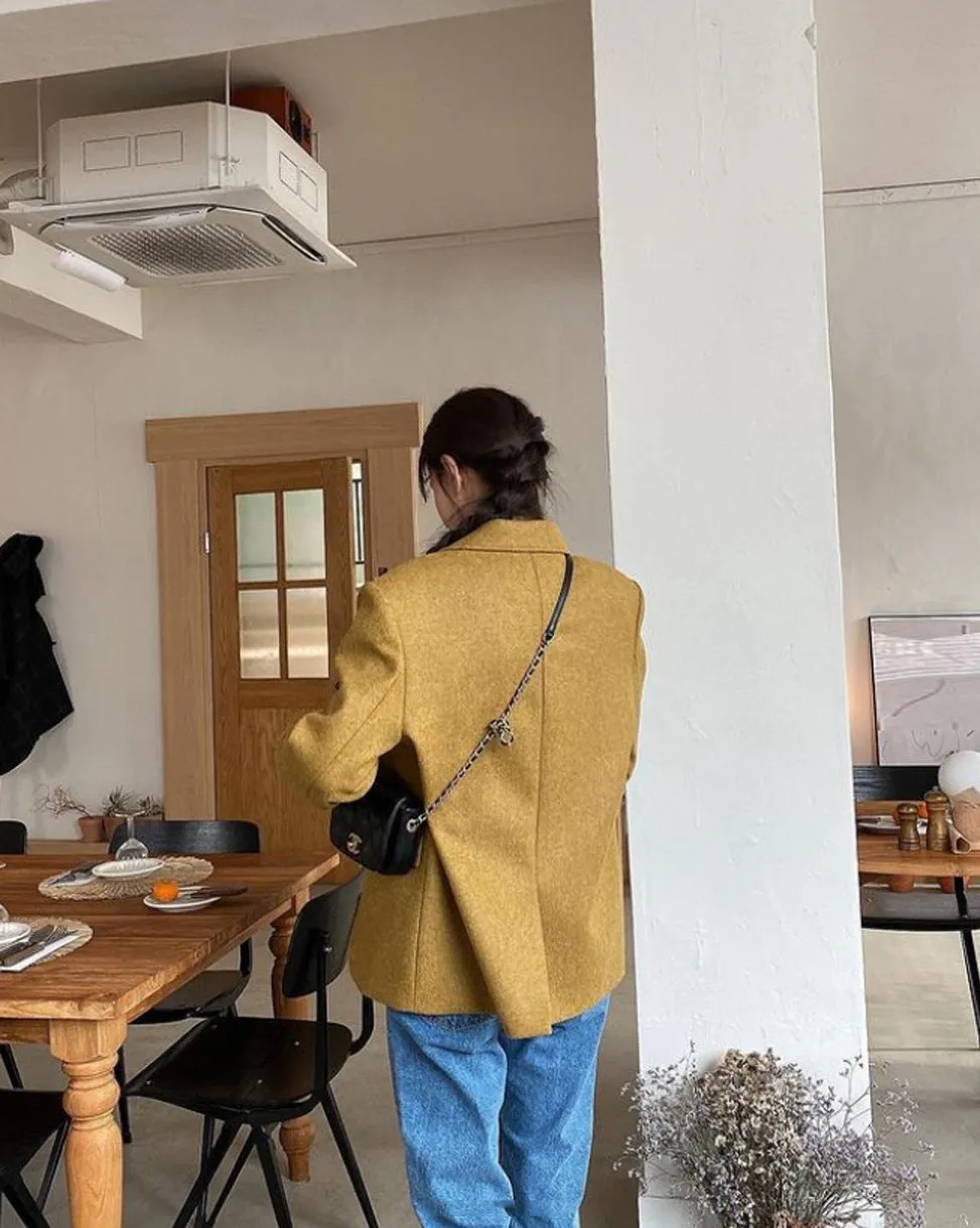 Lapeled single-breasted loose woolen jacket