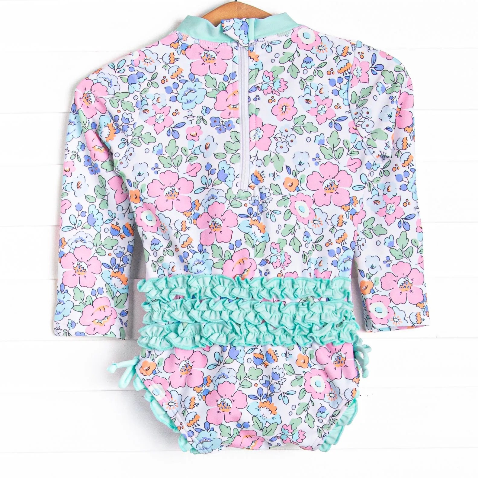 Pink Magnolia Long Sleeve One Piece Rash Guard, Blue