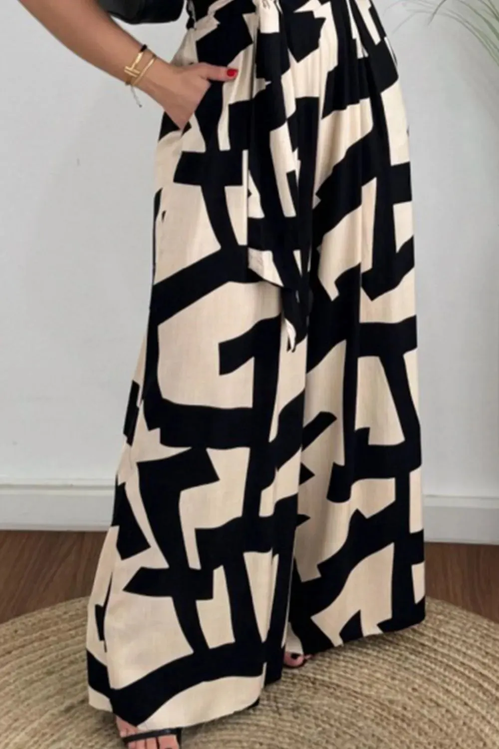 Printed Surplice Sleeveless Tie Waist Jumpsuit