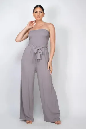 SMOCKED RUFFLED TUBE WAIST-TIE JUMPSUIT